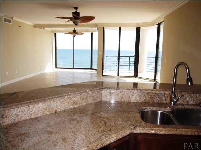 13335 Johnson Beach Road, Unit 802 Pensacola, FL 32507 - Photo 5 of 24 Granite countertops and raised panel cabinetry.