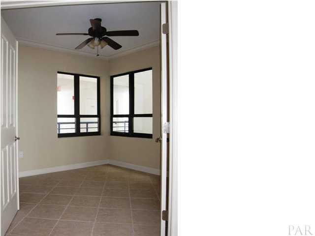 13335 Johnson Beach Road, Unit 802 Pensacola, FL 32507 - Photo 9 of 24 Separate wet bar with beverage refrigerator & ice maker.