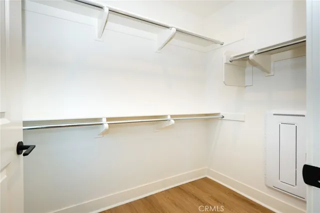a bathroom with a shower sink and mirror