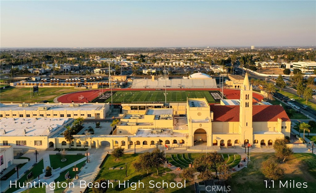 414 Main Street, Unit 400 Huntington Beach, CA 92648 - Photo 24 of 29 an aerial view of residential building and lake