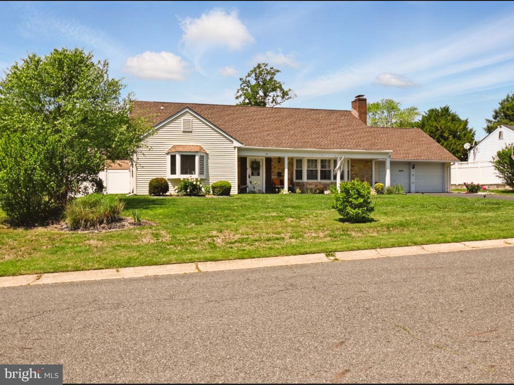 60 Windsor Lane Willingboro, NJ 08046 - Photo 2 of 58 a front view of house with yard and green space