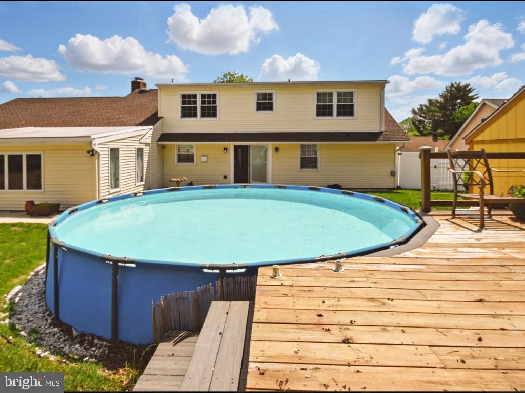 60 Windsor Lane Willingboro, NJ 08046 - Photo 21 of 58 a view of a house with a swimming pool
