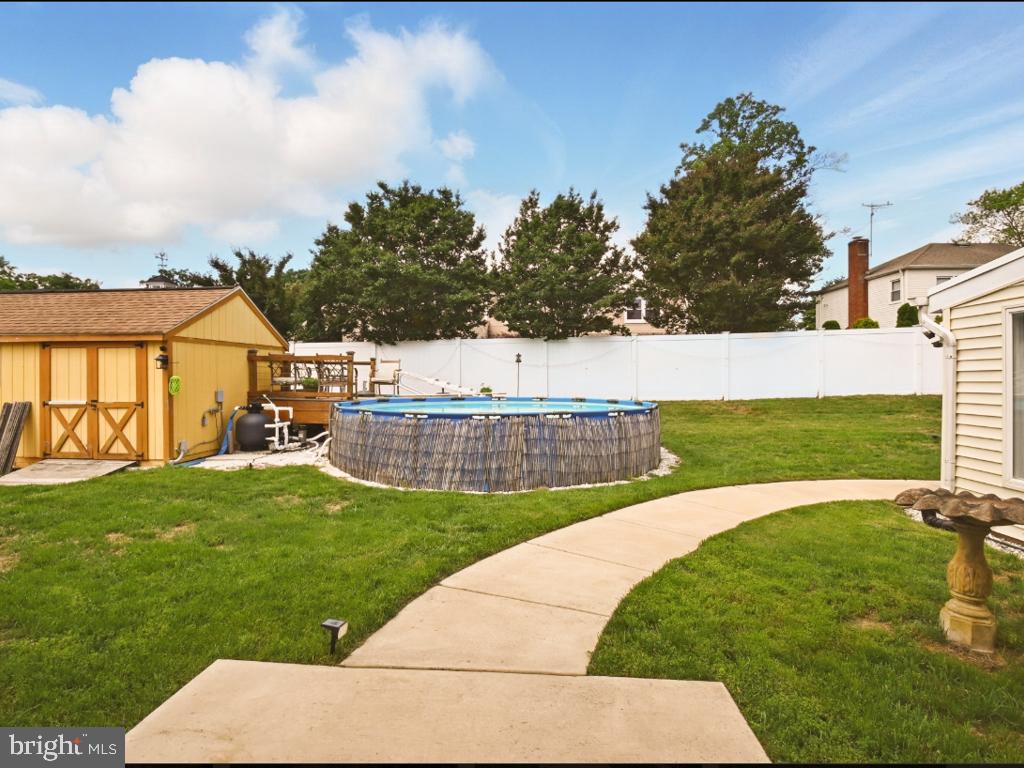 60 Windsor Lane Willingboro, NJ 08046 - Photo 22 of 58 a view of a backyard with swimming pool