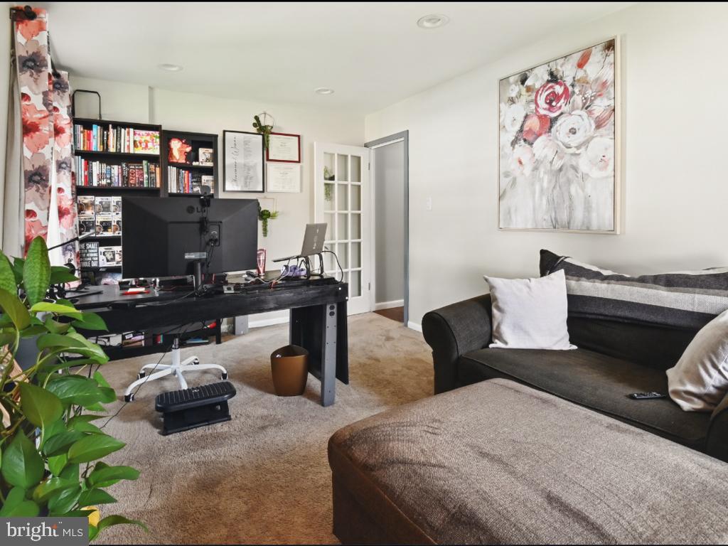 60 Windsor Lane Willingboro, NJ 08046 - Photo 30 of 58 a bedroom with bed and a couch