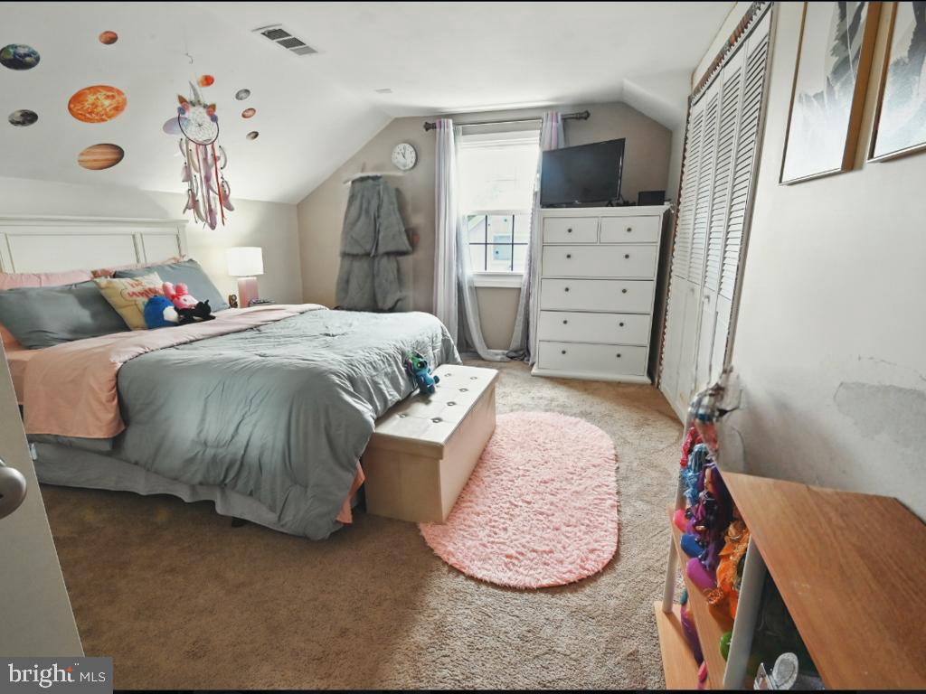 60 Windsor Lane Willingboro, NJ 08046 - Photo 33 of 58 a bedroom with a bed and window