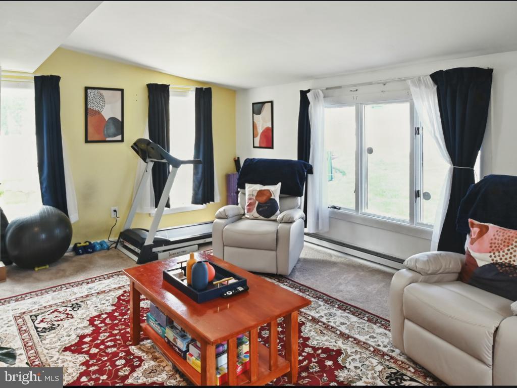 60 Windsor Lane Willingboro, NJ 08046 - Photo 34 of 58 a bedroom with furniture and a window