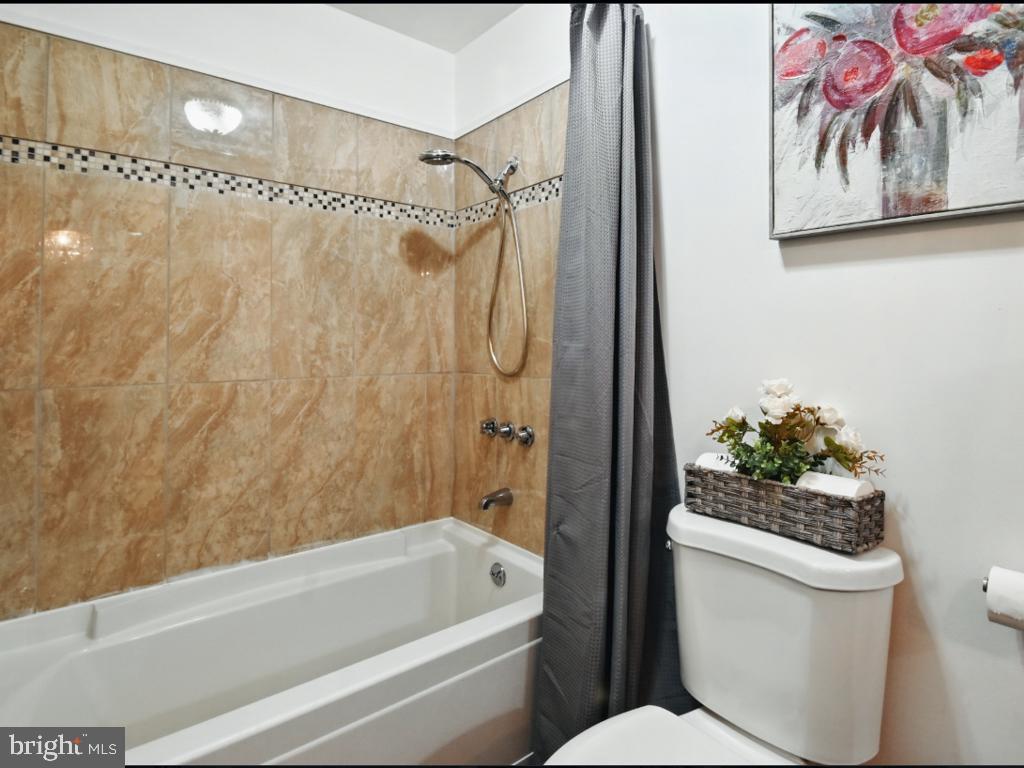 60 Windsor Lane Willingboro, NJ 08046 - Photo 41 of 58 a bathroom with a toilet and a shower