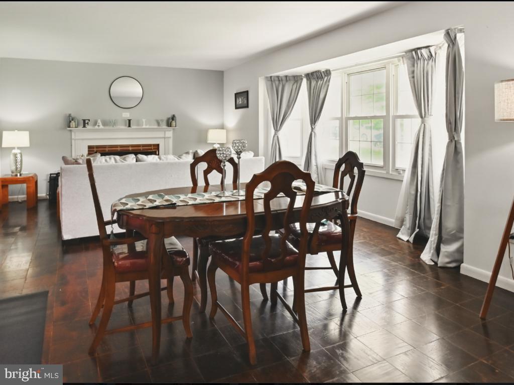 60 Windsor Lane Willingboro, NJ 08046 - Photo 48 of 58 a view of a dining room with furniture window and wooden floor