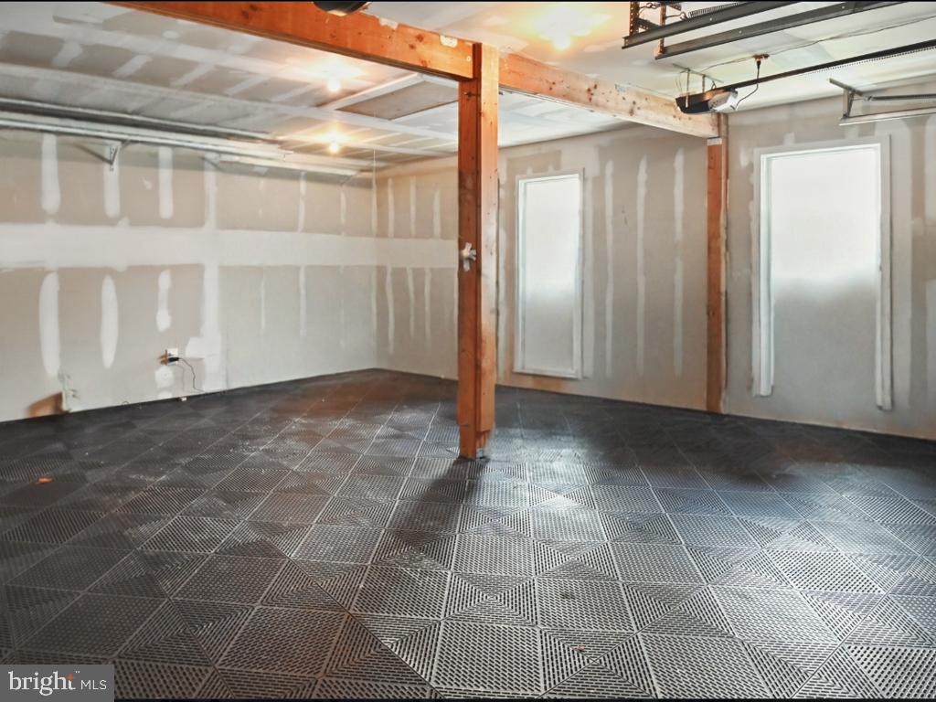 60 Windsor Lane Willingboro, NJ 08046 - Photo 58 of 58 a view of a refrigerator in an empty room
