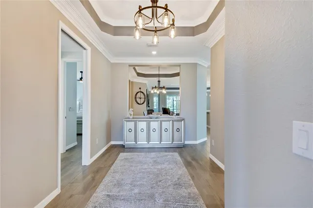 a kitchen with stainless steel appliances a sink stove and cabinets