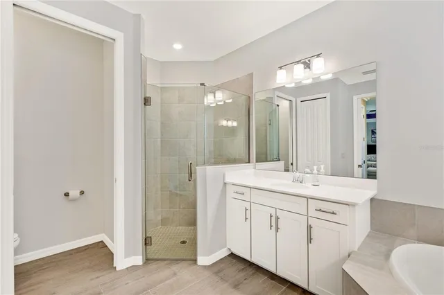 a utility room with sink dryer and washer