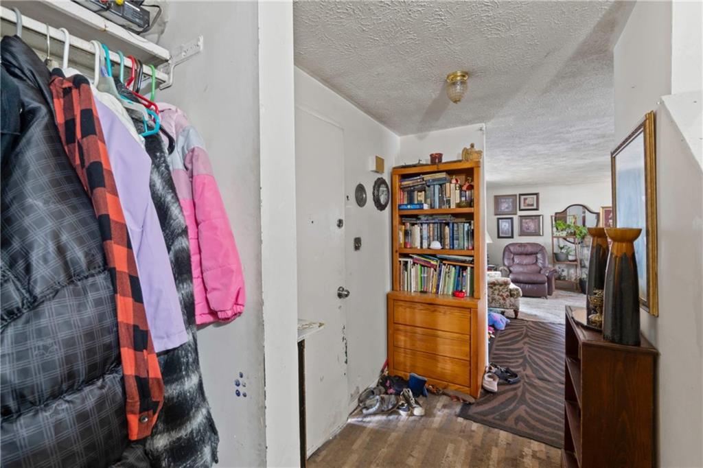1781 Ivanhoe Drive Irwin, PA 15642 - Photo 24 of 35 a view of walk in closet with clothes and shoes
