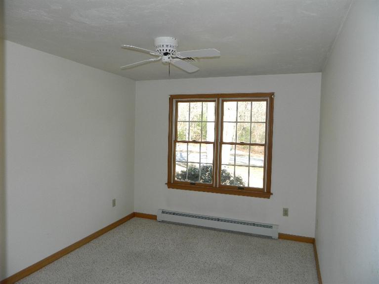 20 Millrace Road Marstons Mills, MA 02648 - Photo 20 of 32 an empty room with windows