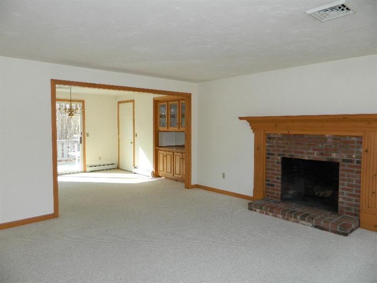 20 Millrace Road Marstons Mills, MA 02648 - Photo 7 of 32 a view of empty room with a fireplace