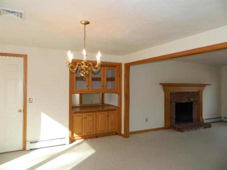 20 Millrace Road Marstons Mills, MA 02648 - Photo 9 of 32 a view of a livingroom with chandelier and entryway