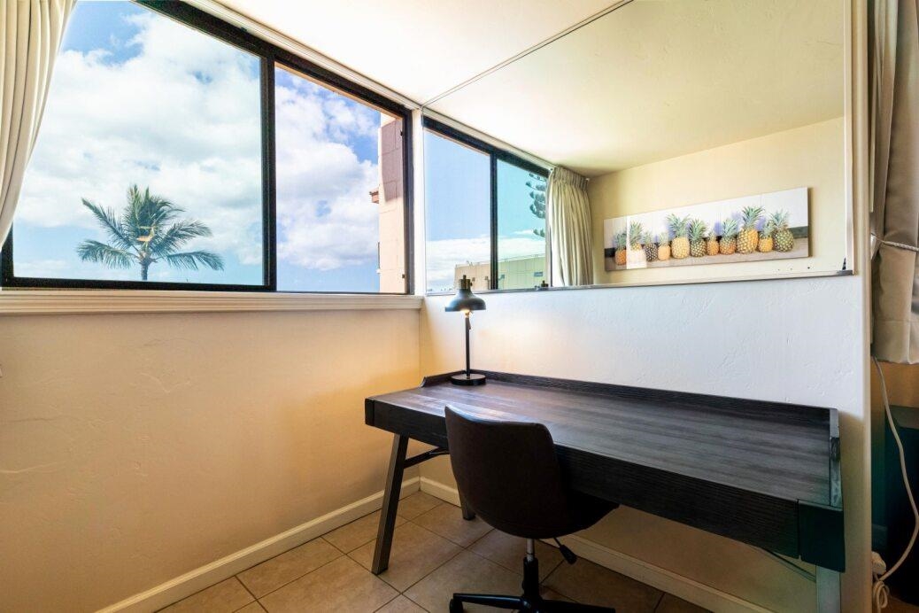 191 North Kihei Road, Unit 502 Kihei, HI 96753 - Photo 12 of 37 a view of a room with furniture and wooden floor