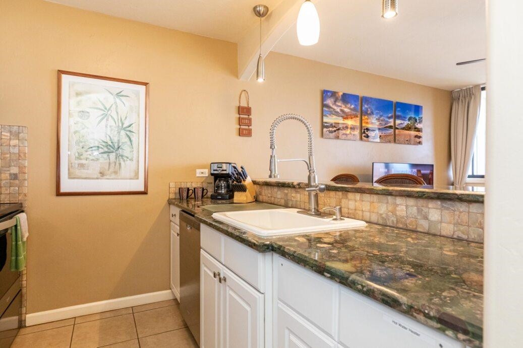 191 North Kihei Road, Unit 502 Kihei, HI 96753 - Photo 16 of 37 a bathroom with a sink and a mirror