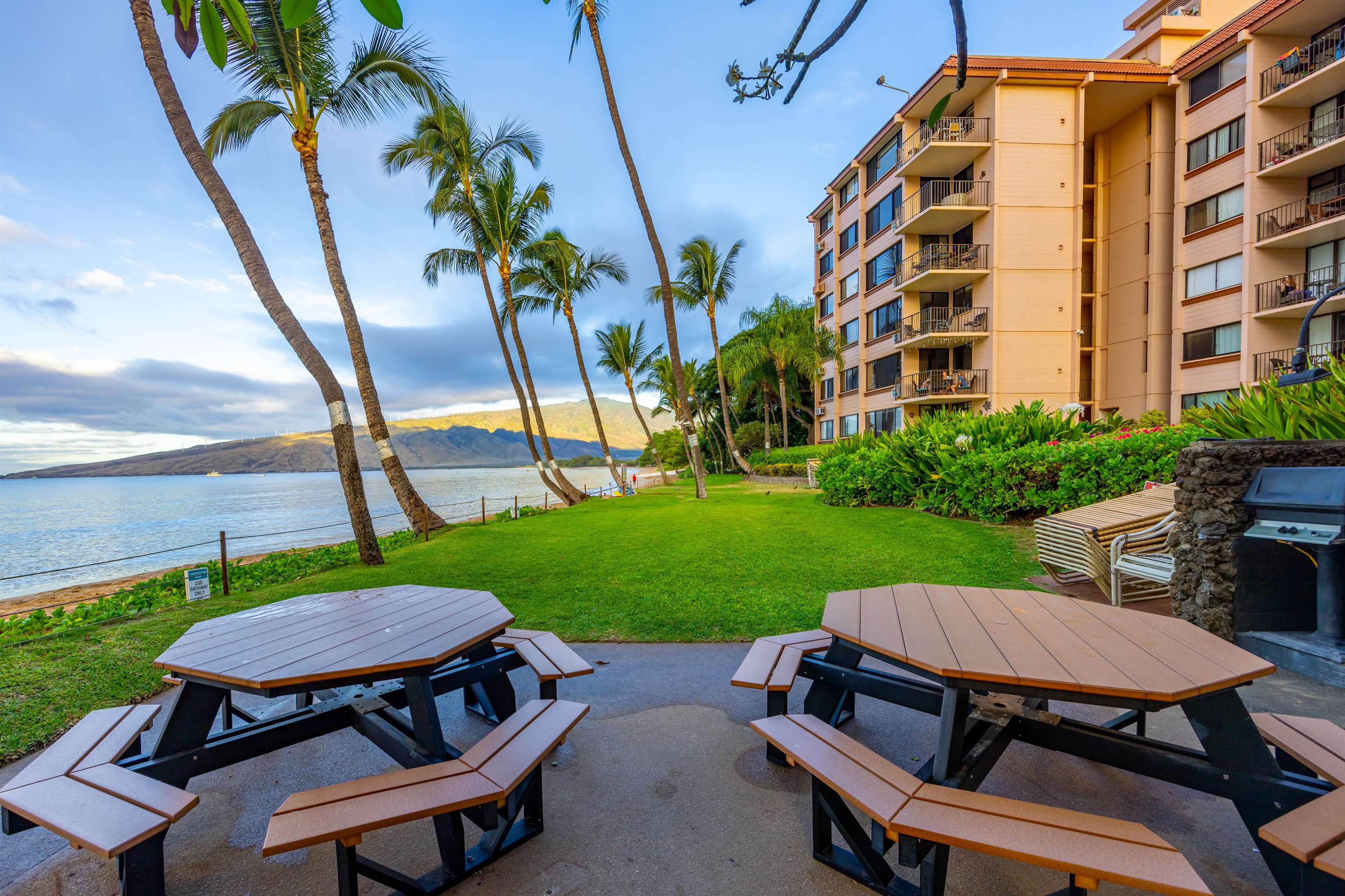 191 North Kihei Road, Unit 502 Kihei, HI 96753 - Photo 21 of 37 a backyard of a house with outdoor seating