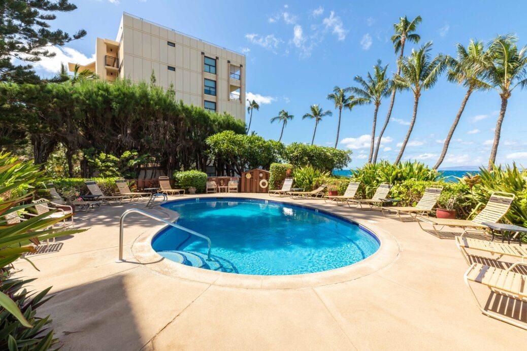 191 North Kihei Road, Unit 502 Kihei, HI 96753 - Photo 22 of 37 a view of a swimming pool with a patio