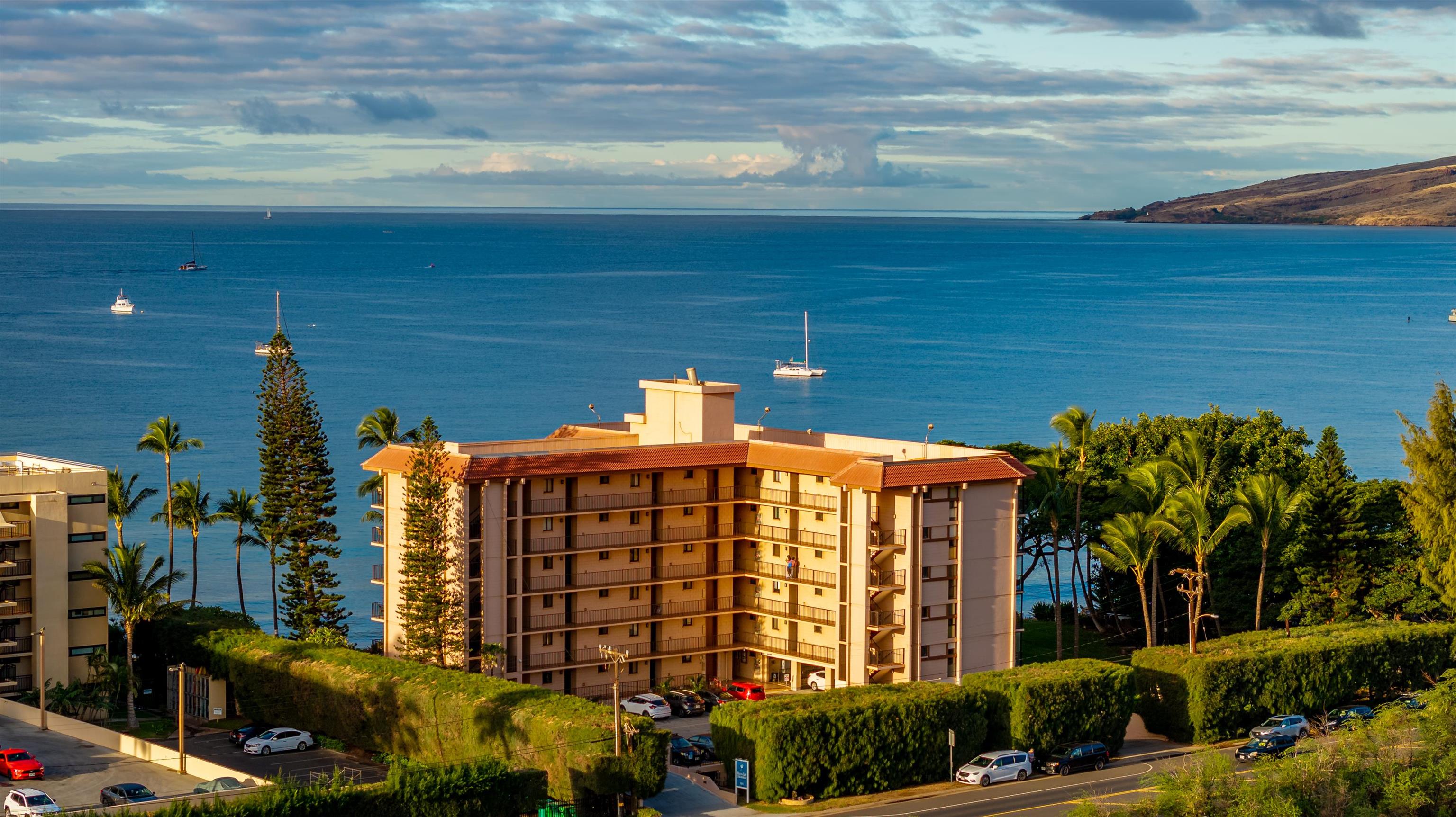 191 North Kihei Road, Unit 502 Kihei, HI 96753 - Photo 27 of 37 a front view of a house with a yard