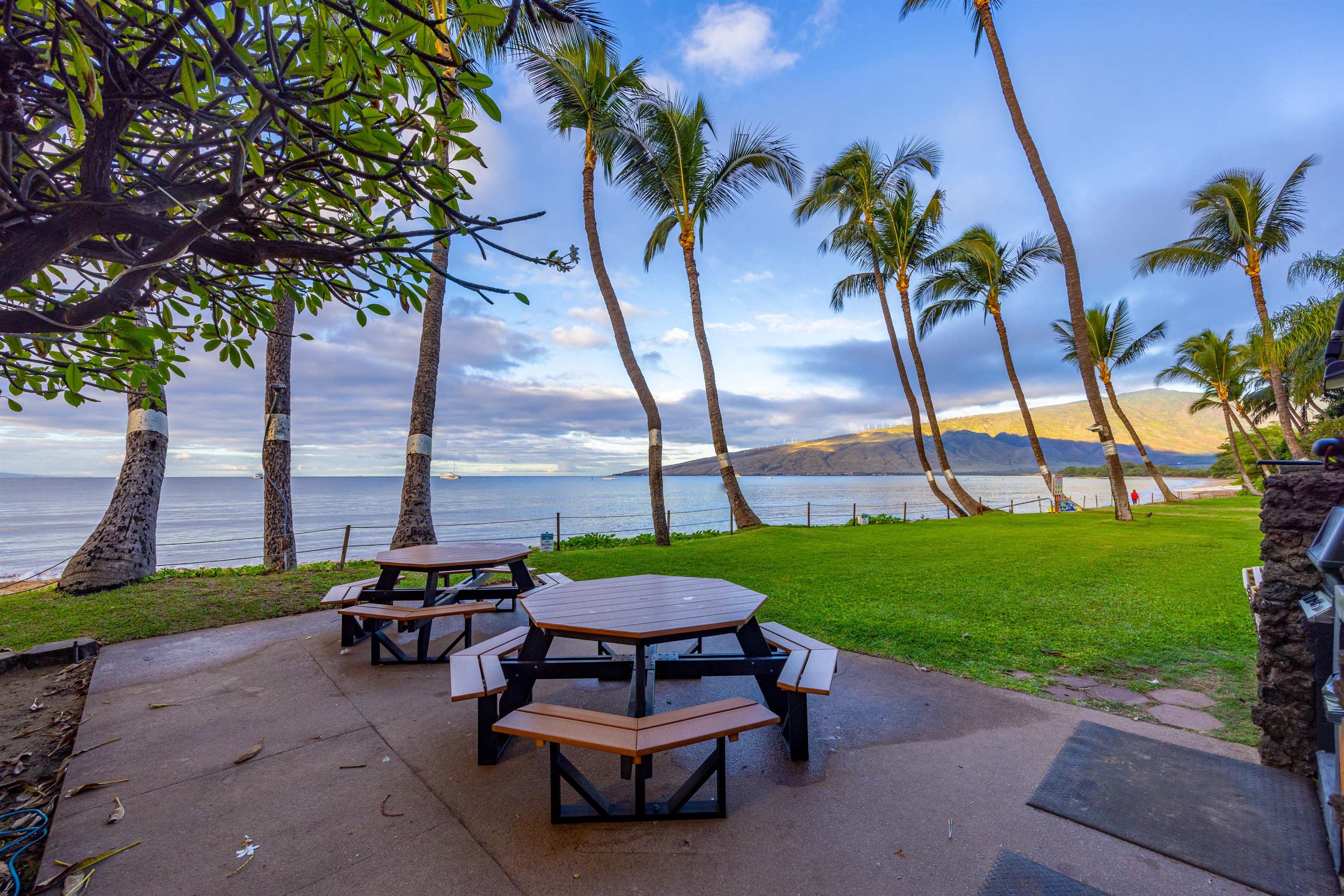 191 North Kihei Road, Unit 502 Kihei, HI 96753 - Photo 35 of 37 a swimming pool with outdoor seating and garden
