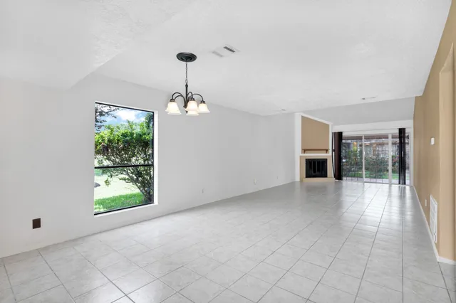 a view of a kitchen with an empty space and kitchen view