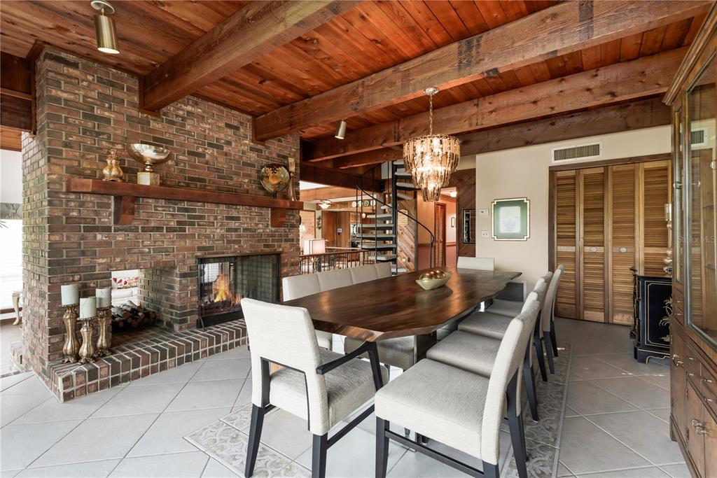 112 1st Street Tavares, FL 32778 - Photo 23 of 38 a view of a patio with a table and chairs