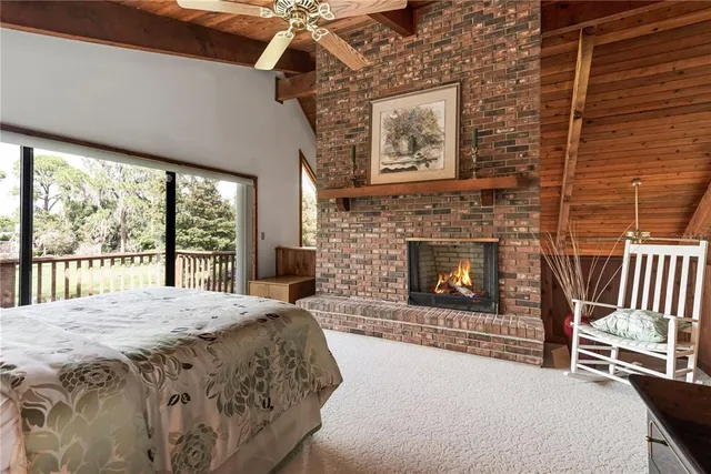 a bed room with a bed and a chair