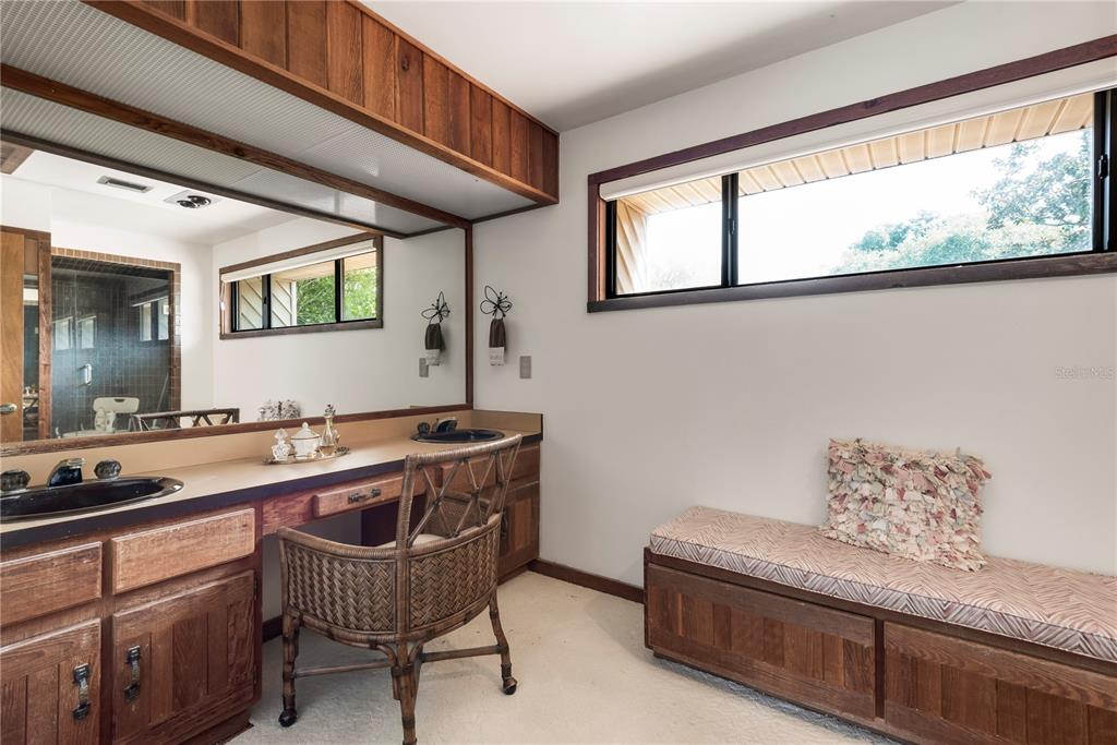 112 1st Street Tavares, FL 32778 - Photo 30 of 38 a room with granite countertop furniture and a wooden floor