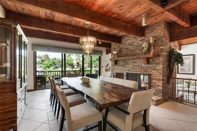 a view of a patio with a table and chairs
