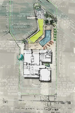 an aerial view of residential houses with outdoor space and trees