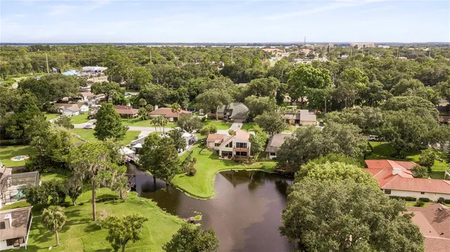 a hallway with furniture and stairs