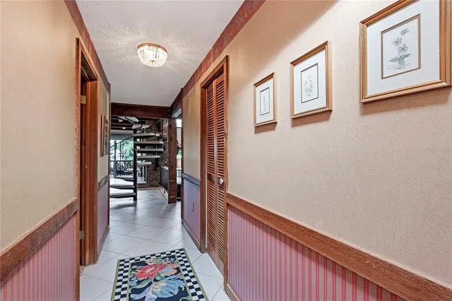 a view of a patio with table and chairs