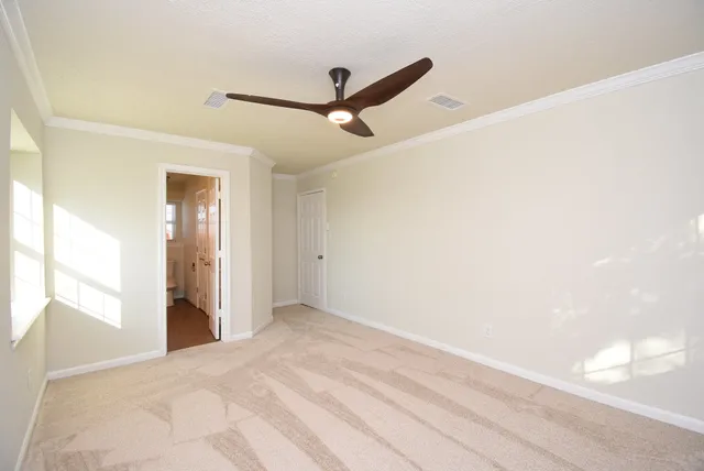 a view of empty room with windows