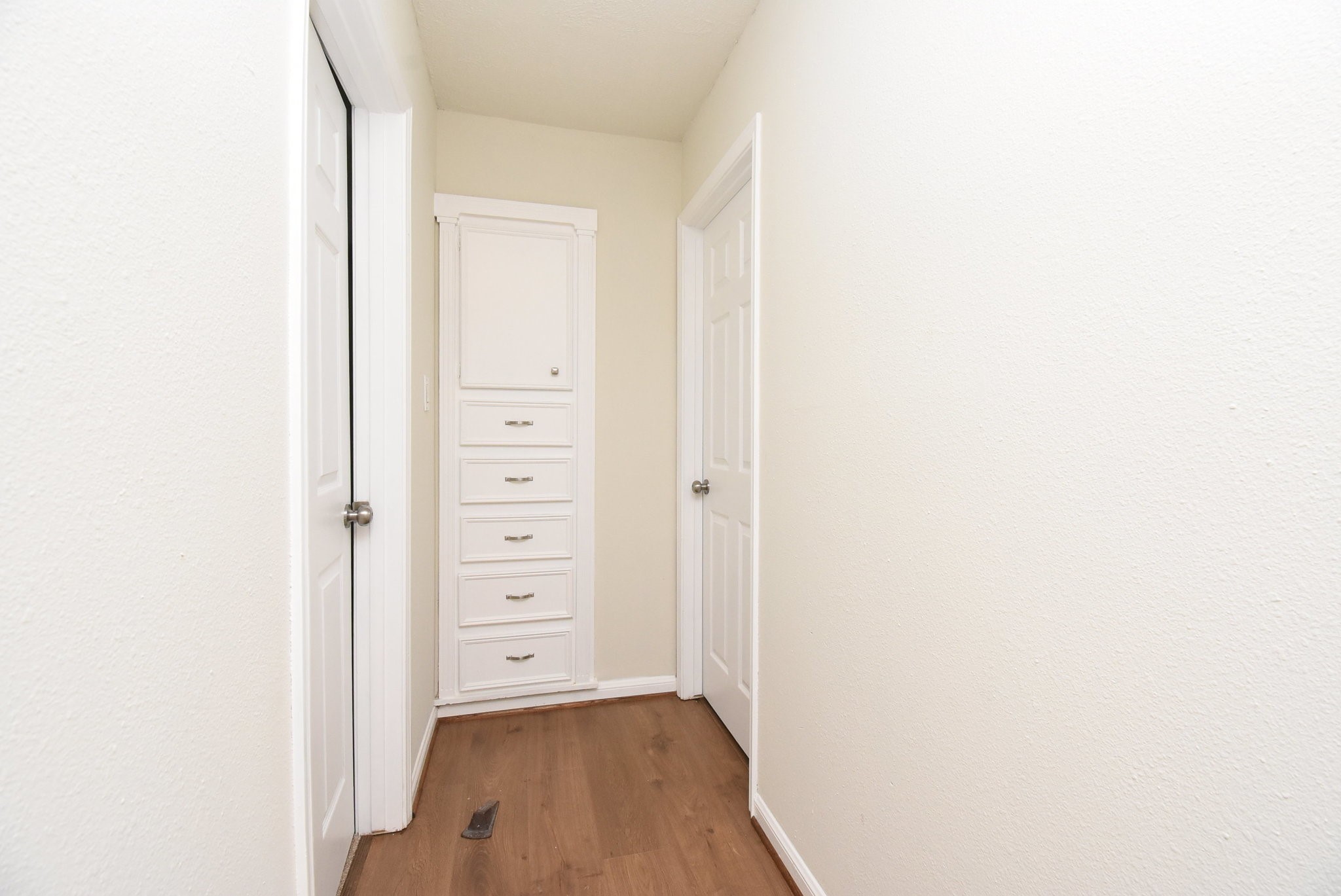 2503 Southwick Street Houston, TX 77080 - Photo 40 of 46 a view of a hallway with wooden floor