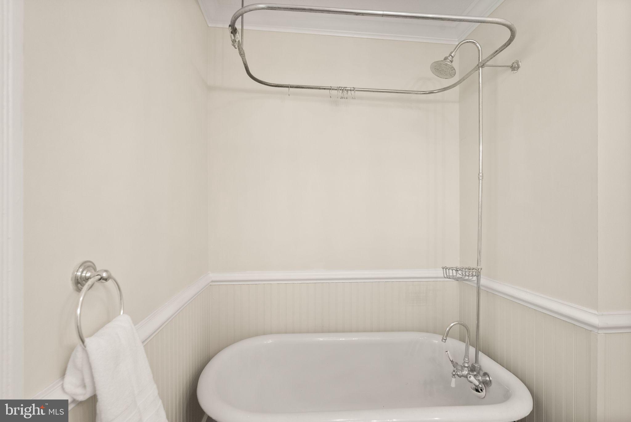 37151 Branchriver Road Purcellville, VA 20132 - Photo 35 of 63 a bathroom with a bath tub with a shower