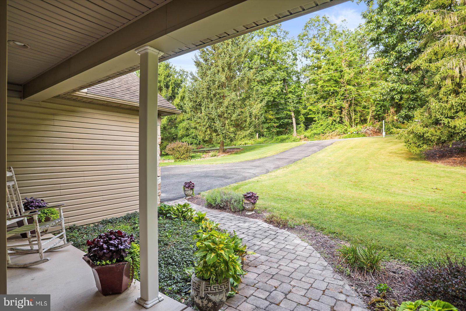 115 Packing House Road Hanover, PA 17331 - Photo 12 of 59 a view of a garden with potted plants