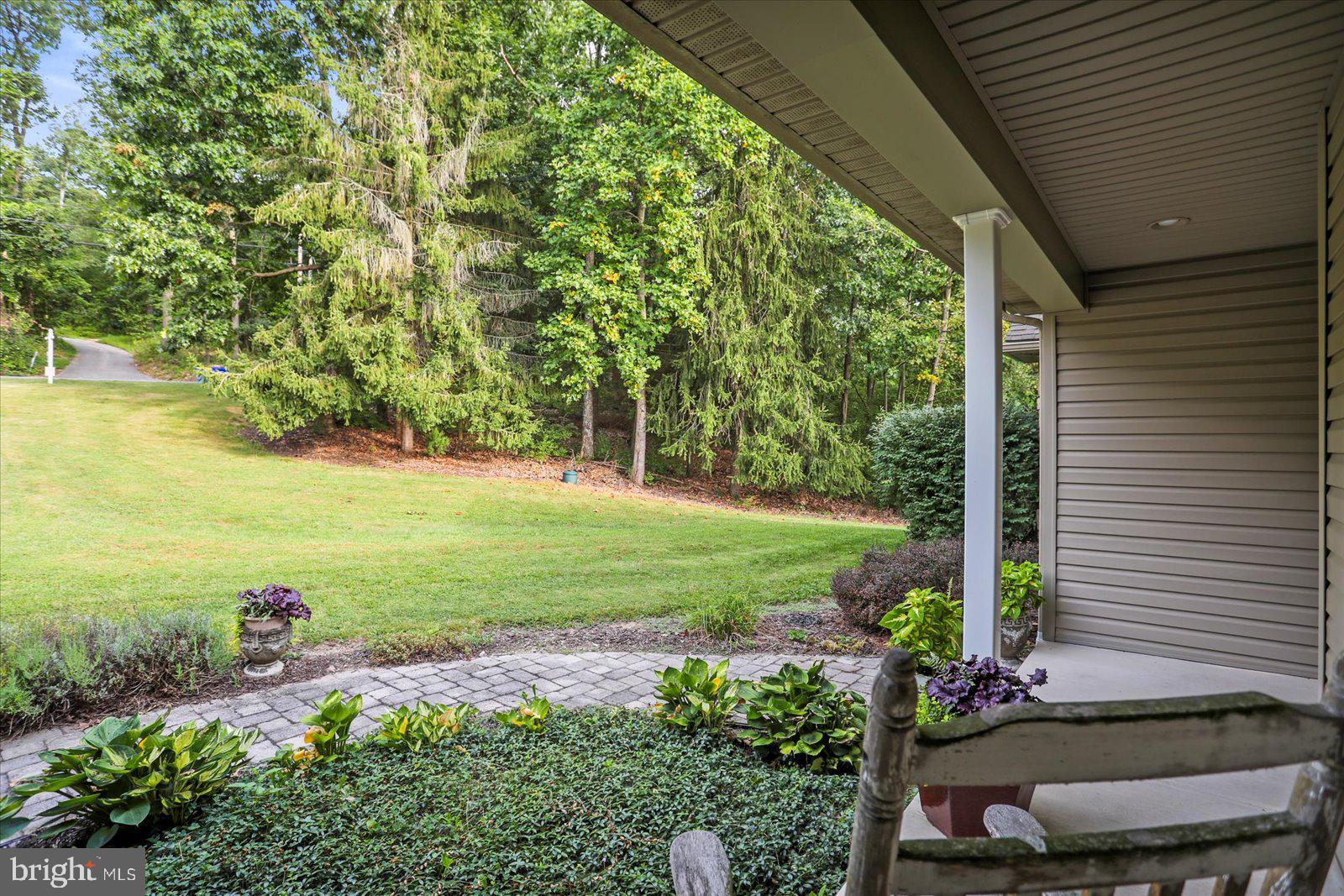 115 Packing House Road Hanover, PA 17331 - Photo 13 of 59 a view of a backyard with plants and garden