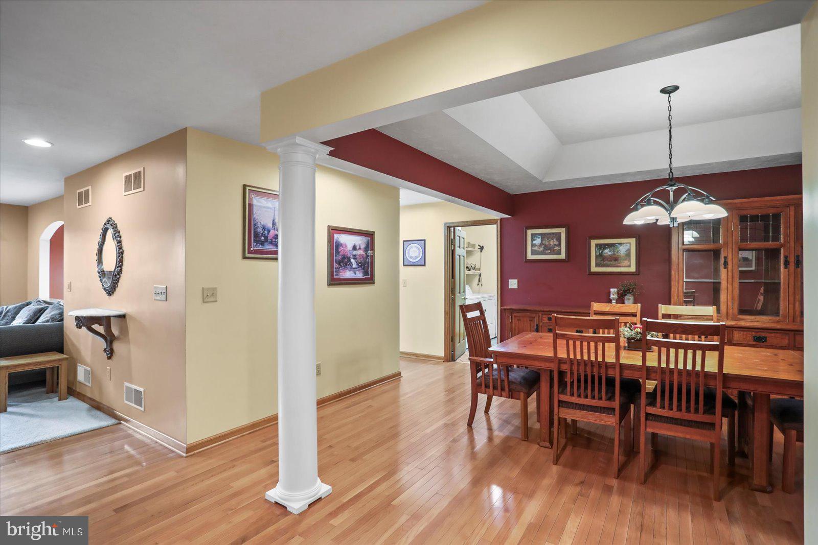 115 Packing House Road Hanover, PA 17331 - Photo 15 of 59 a view of a dining room with furniture window and wooden floor