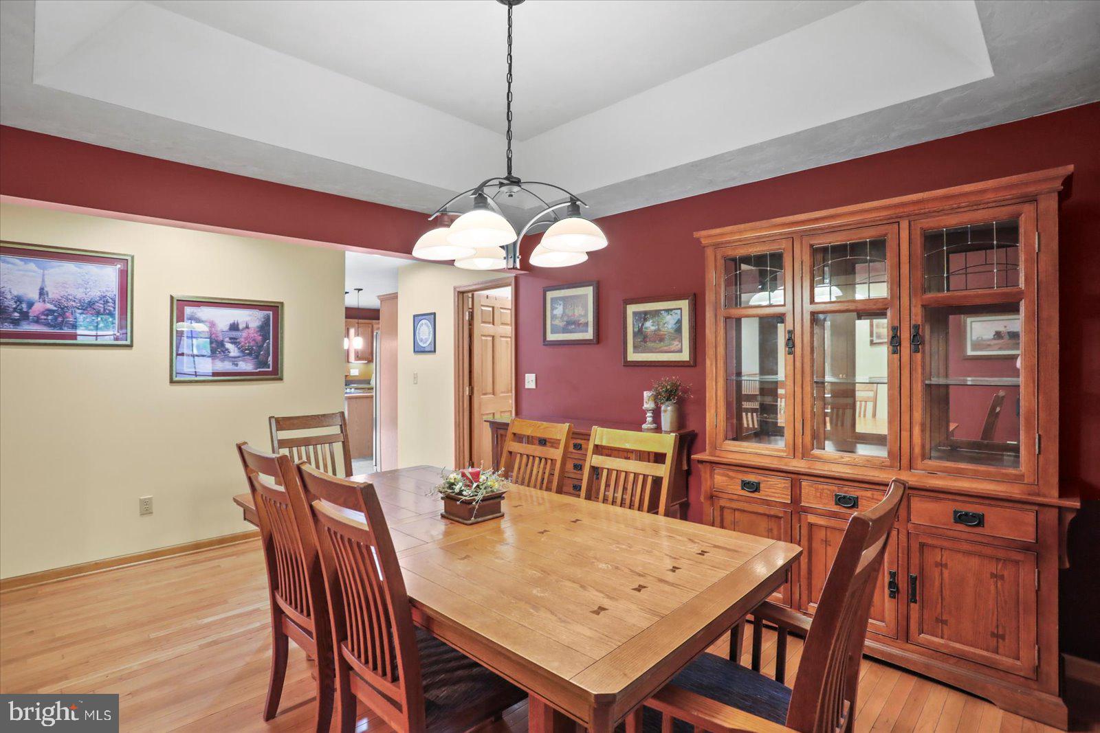 115 Packing House Road Hanover, PA 17331 - Photo 17 of 59 a view of a dining room with furniture window and wooden floor