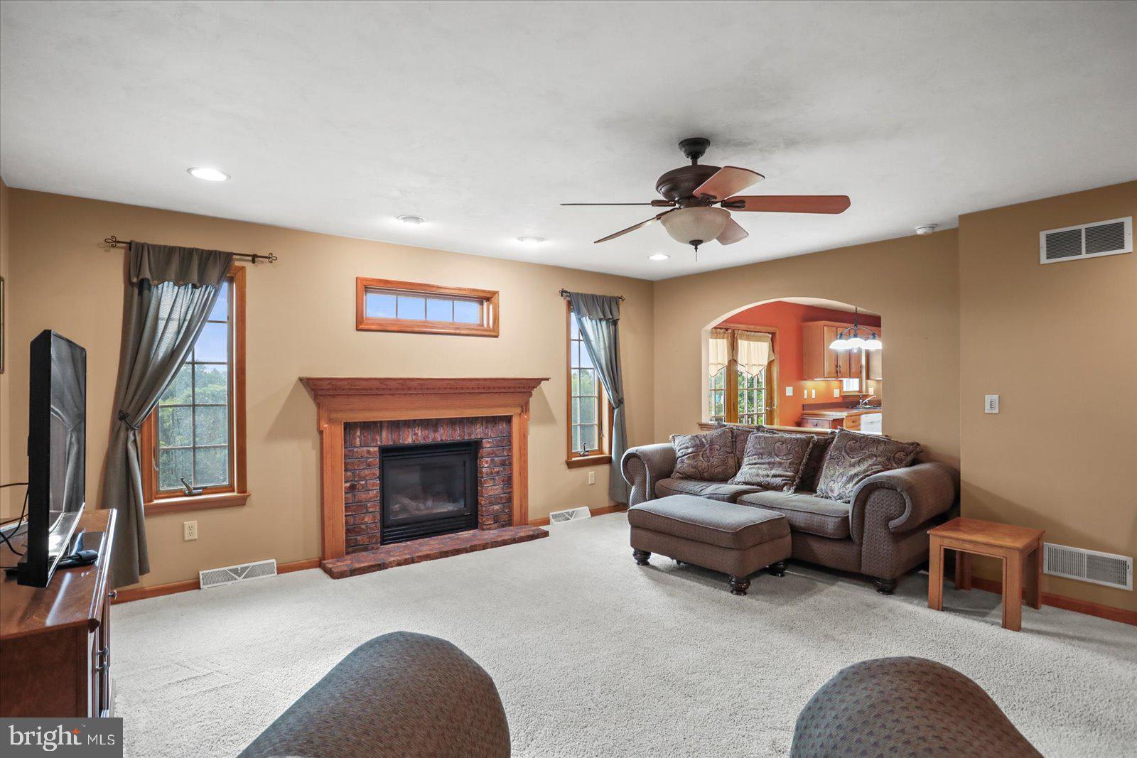 115 Packing House Road Hanover, PA 17331 - Photo 20 of 59 a living room with furniture and a fireplace