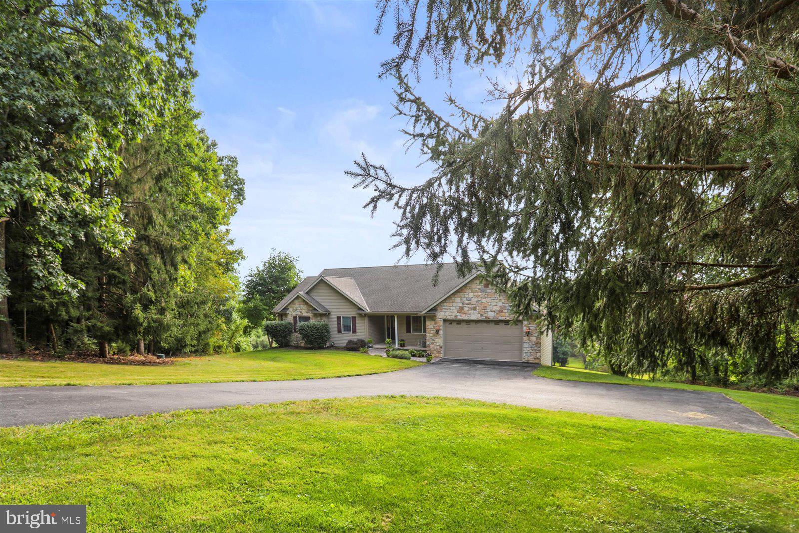 115 Packing House Road Hanover, PA 17331 - Photo 3 of 59 a view of a swimming pool with an outdoor space and seating area