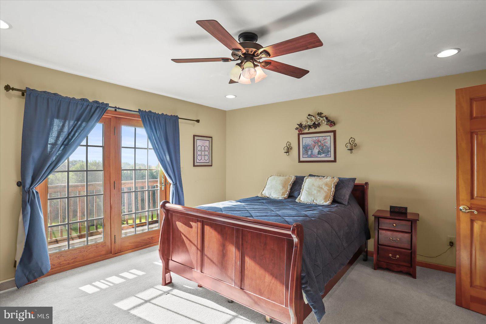 115 Packing House Road Hanover, PA 17331 - Photo 33 of 59 a bedroom with a bed and a large window