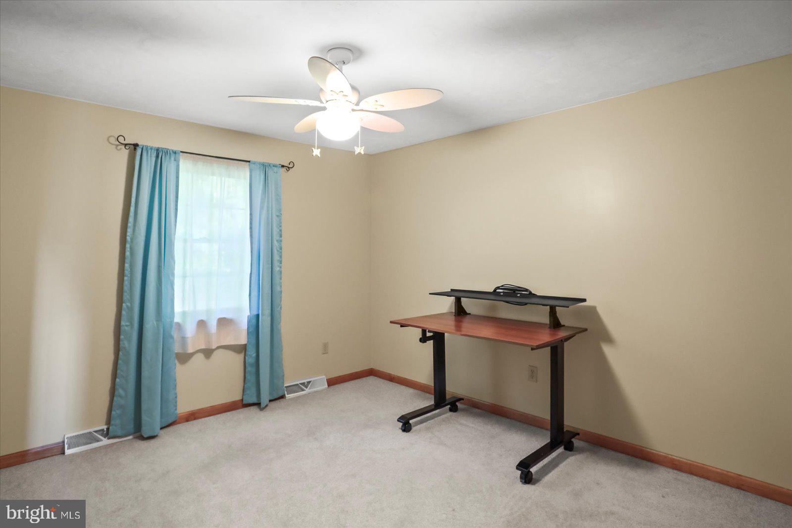 115 Packing House Road Hanover, PA 17331 - Photo 41 of 59 a view of a room with a chandeliers