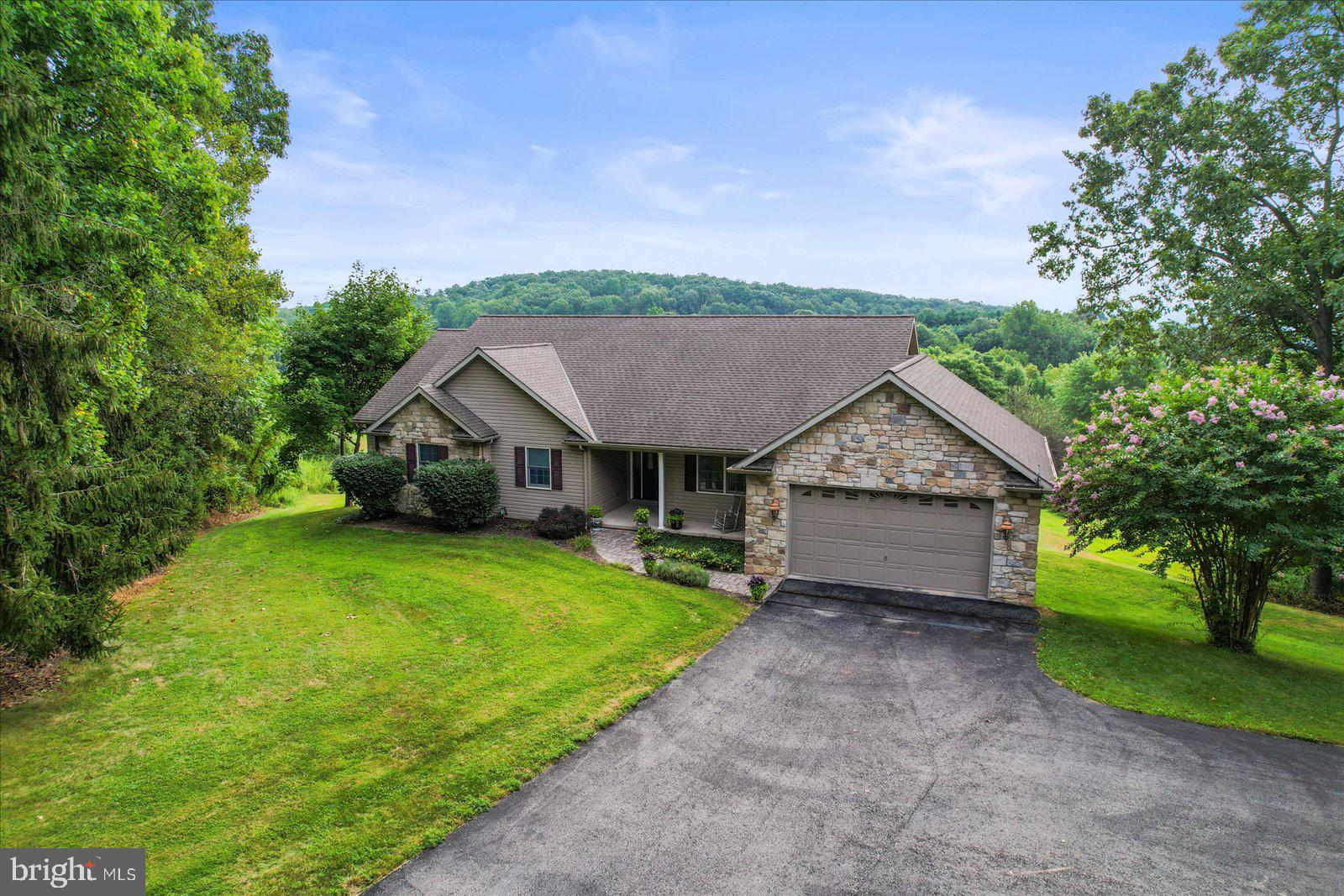 115 Packing House Road Hanover, PA 17331 - Photo 5 of 59 a house view with a garden space