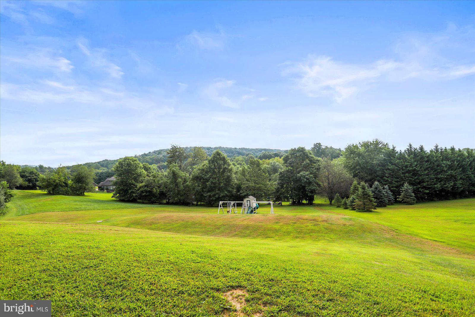 115 Packing House Road Hanover, PA 17331 - Photo 58 of 59 a view of a swimming pool and mountains in the background