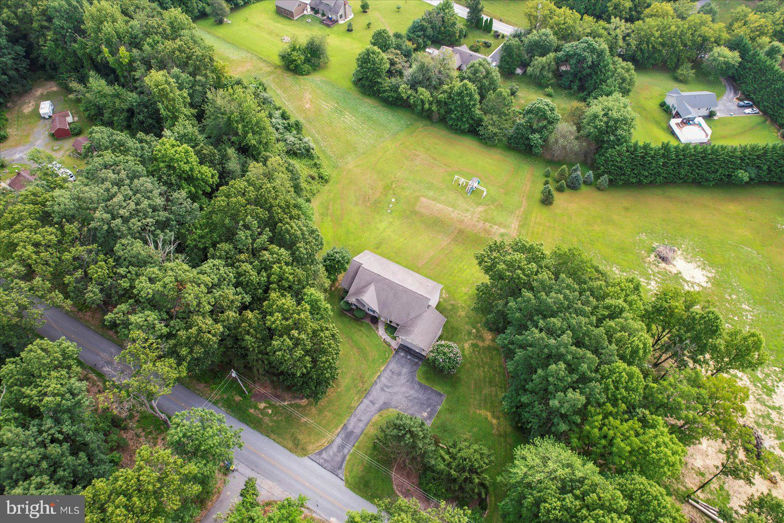 115 Packing House Road Hanover, PA 17331 - Photo 6 of 59 an aerial view of lake residential house with outdoor space and trees around