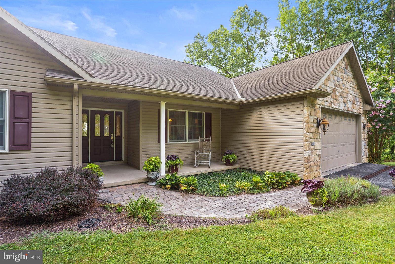 115 Packing House Road Hanover, PA 17331 - Photo 9 of 59 a front view of a house with garden