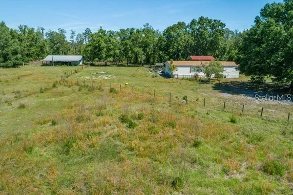 a house view with a outdoor space