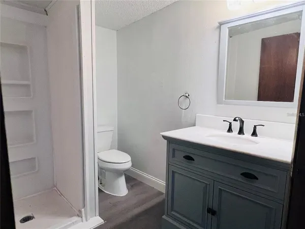 a bathroom with a sink and a toilet
